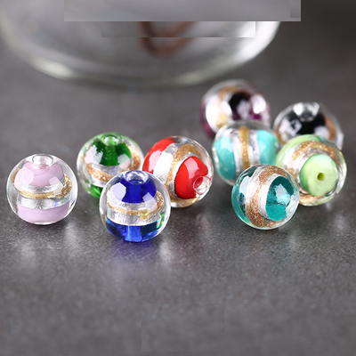 Glass Balls With Silver Foil And Sand Artwork